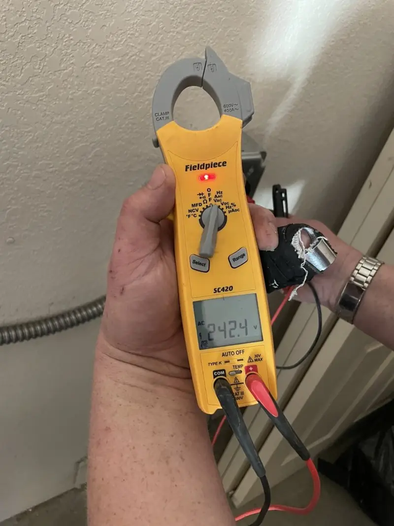 Voltage testing with clamp meter during Circuit Breaker Repair in Simpsonville